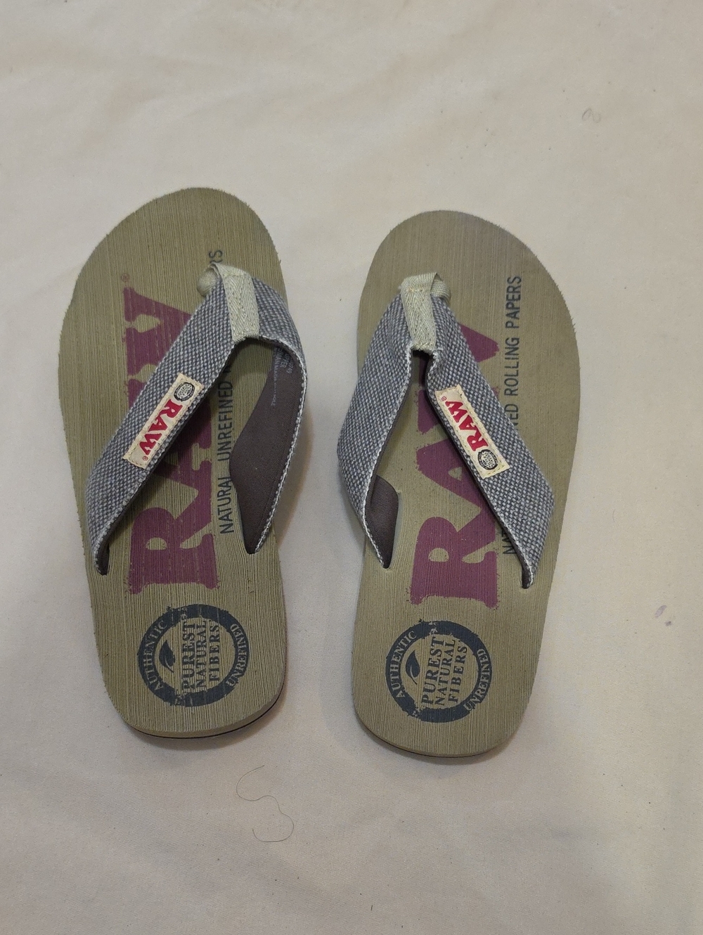 Brand New Lightweight gray canvas flip flops by RAW.